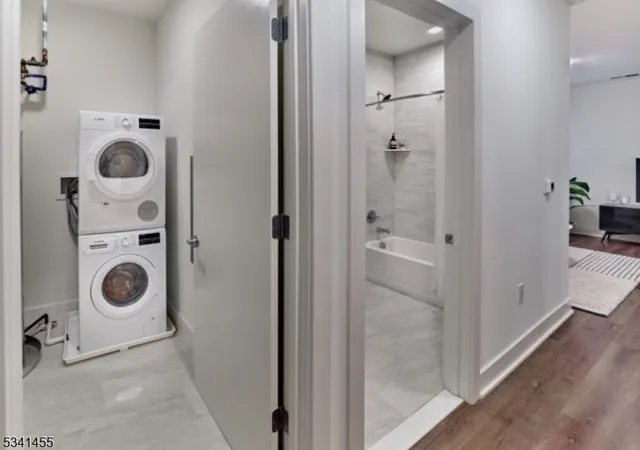 a bathroom with a washing machine and dryer