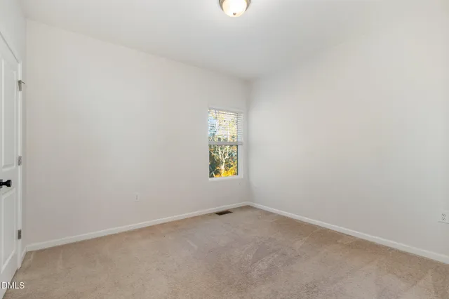 an empty room with window