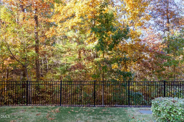 a view of lake with a large trees
