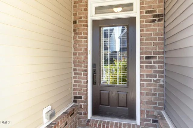 a view of a door and a window