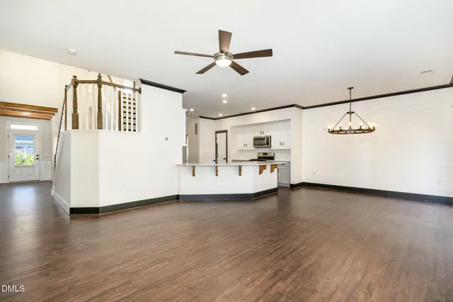 a view of livingroom with furniture and wooden floor