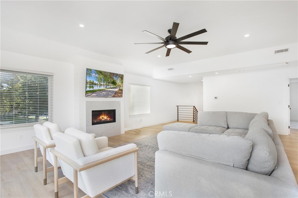 6265 Majorca Circle Long Beach, CA 90803 - Photo 11 of 38 a living room with furniture and a fireplace