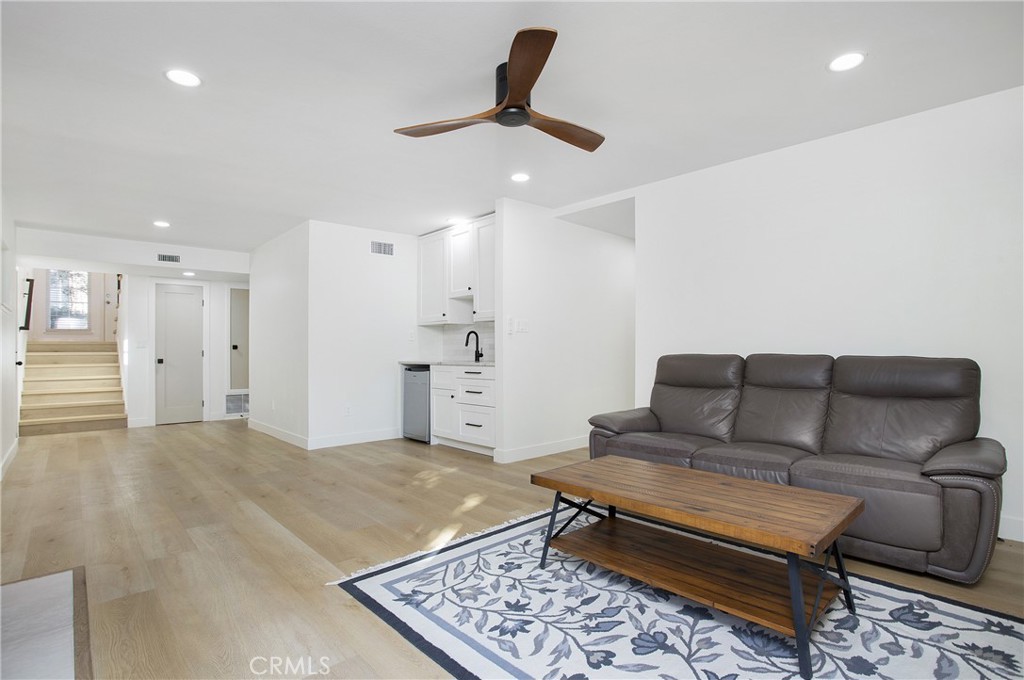 6265 Majorca Circle Long Beach, CA 90803 - Photo 19 of 38 a living room with furniture and a rug
