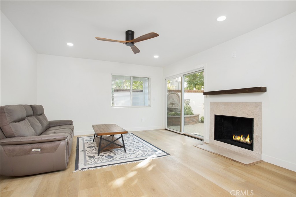 6265 Majorca Circle Long Beach, CA 90803 - Photo 21 of 38 a living room with furniture and a fireplace