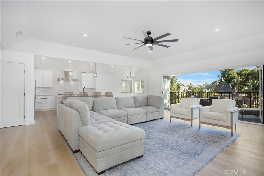 6265 Majorca Circle Long Beach, CA 90803 - Photo 8 of 38 a living room with furniture white walls and white walls