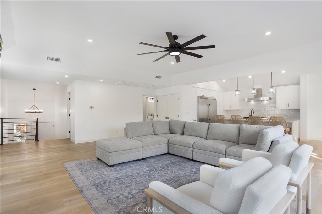 6265 Majorca Circle Long Beach, CA 90803 - Photo 10 of 38 a living room with furniture and a view of kitchen