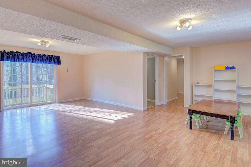 8269 Sycamore Road Lusby, MD 20657 - Photo 16 of 26 Family Room Lower Level