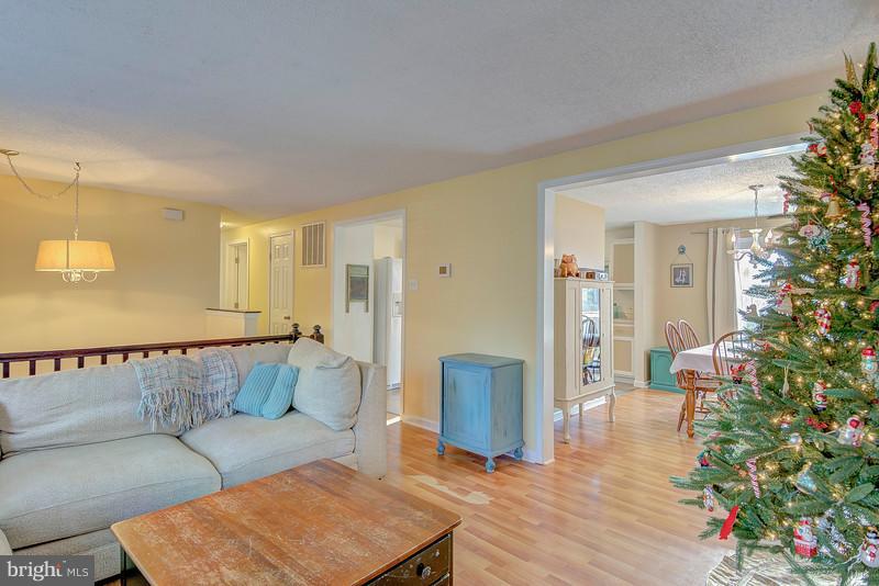 8269 Sycamore Road Lusby, MD 20657 - Photo 9 of 26 Living Room Upper Level