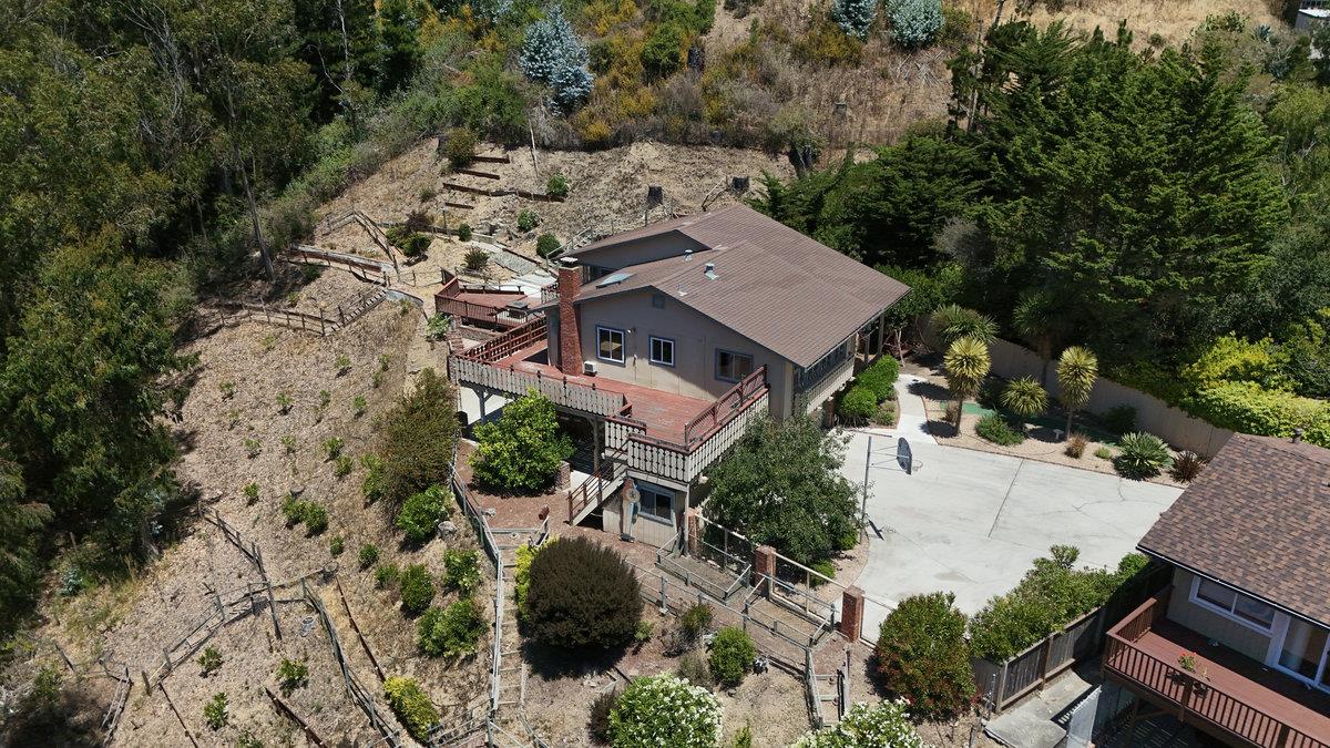 41 Point Reyes Way Pacifica, CA 94044 - Photo 54 of 58 an aerial view of a house with a yard