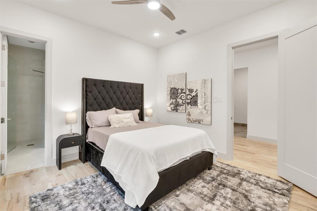 7519 Robin Road Dallas, TX 75209 - Photo 16 of 33 Recessed lighting, ceiling fan, light wood-finish flooring, and a shower with glass enclosure