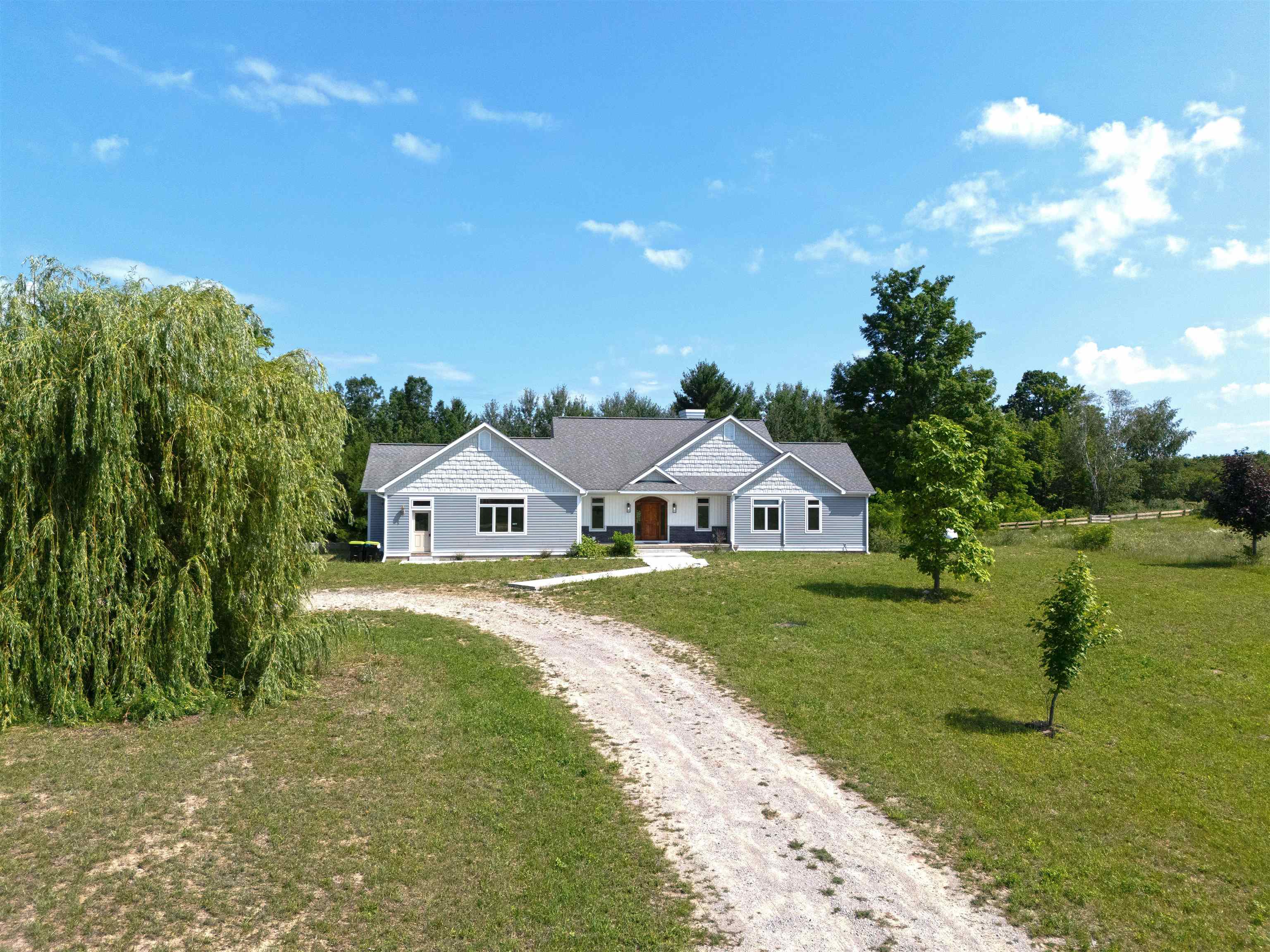 8255 Angell Road Williamsburg, MI 49690 - Photo 4 of 39 1947611-c1aaa7c9-1a3d-4393-ac46-81614e458f3b.JPG