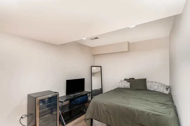 a room with furniture and a flat screen tv