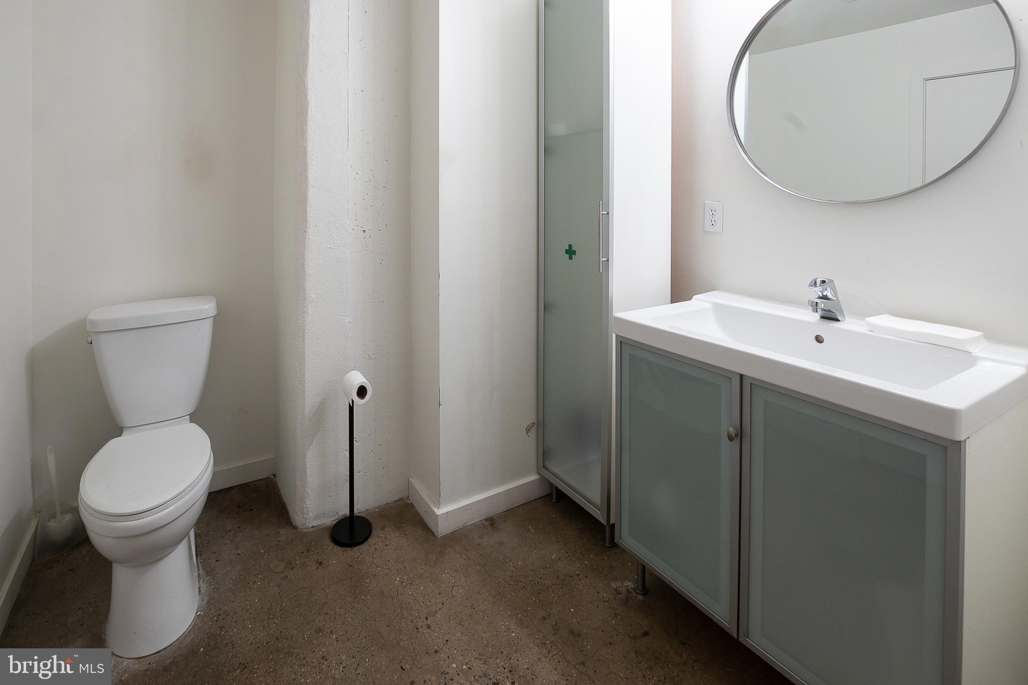 20 North 3rd Street, Unit 302 Philadelphia, PA 19106 - Photo 14 of 17 a bathroom with a toilet and a sink