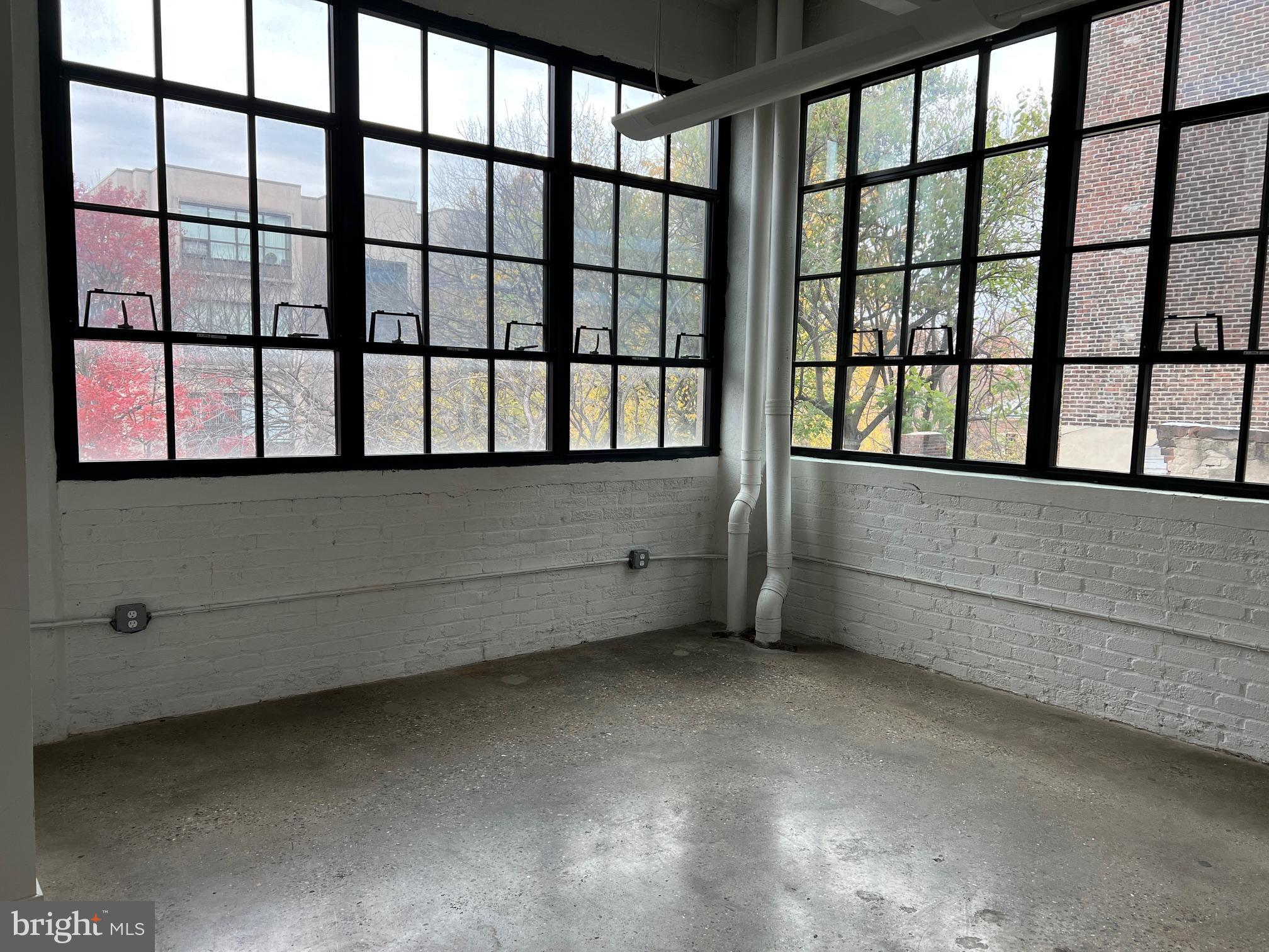 20 North 3rd Street, Unit 302 Philadelphia, PA 19106 - Photo 17 of 17 a view of a room with rack on the wall
