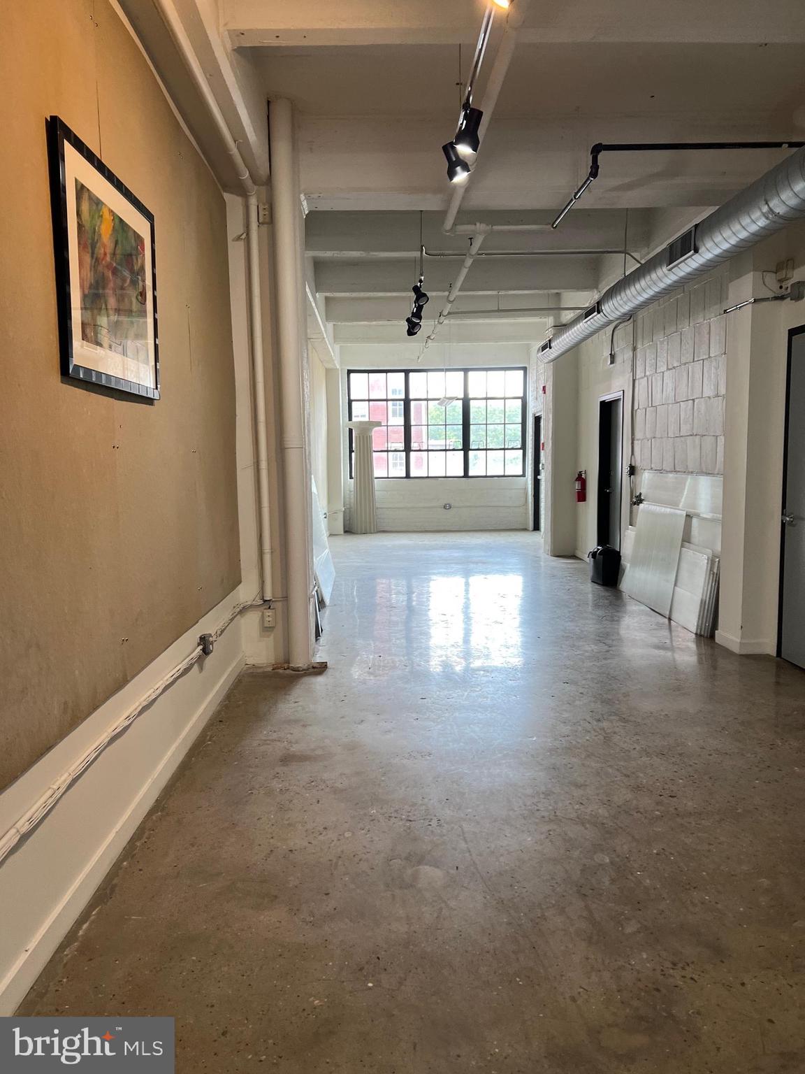 20 North 3rd Street, Unit 302 Philadelphia, PA 19106 - Photo 5 of 17 a view of a hallway with windows