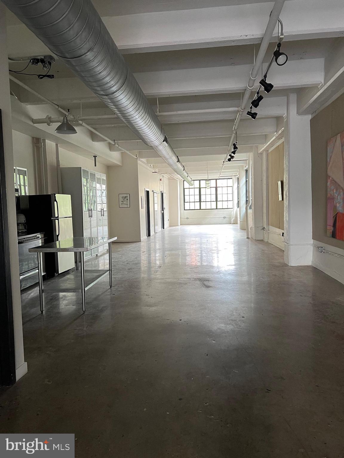 20 North 3rd Street, Unit 302 Philadelphia, PA 19106 - Photo 8 of 17 a view of a hall with wooden floor