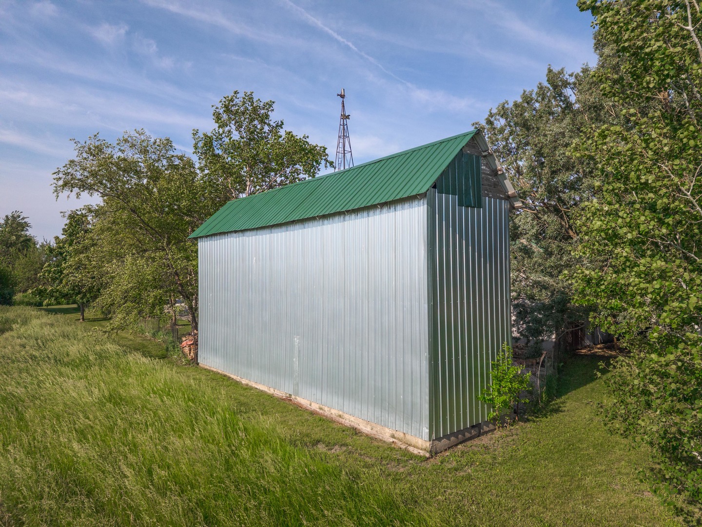 22037 East 2600 N Road Odell, IL 60460 - Photo 55 of 59 a backyard of a house with lots of green space