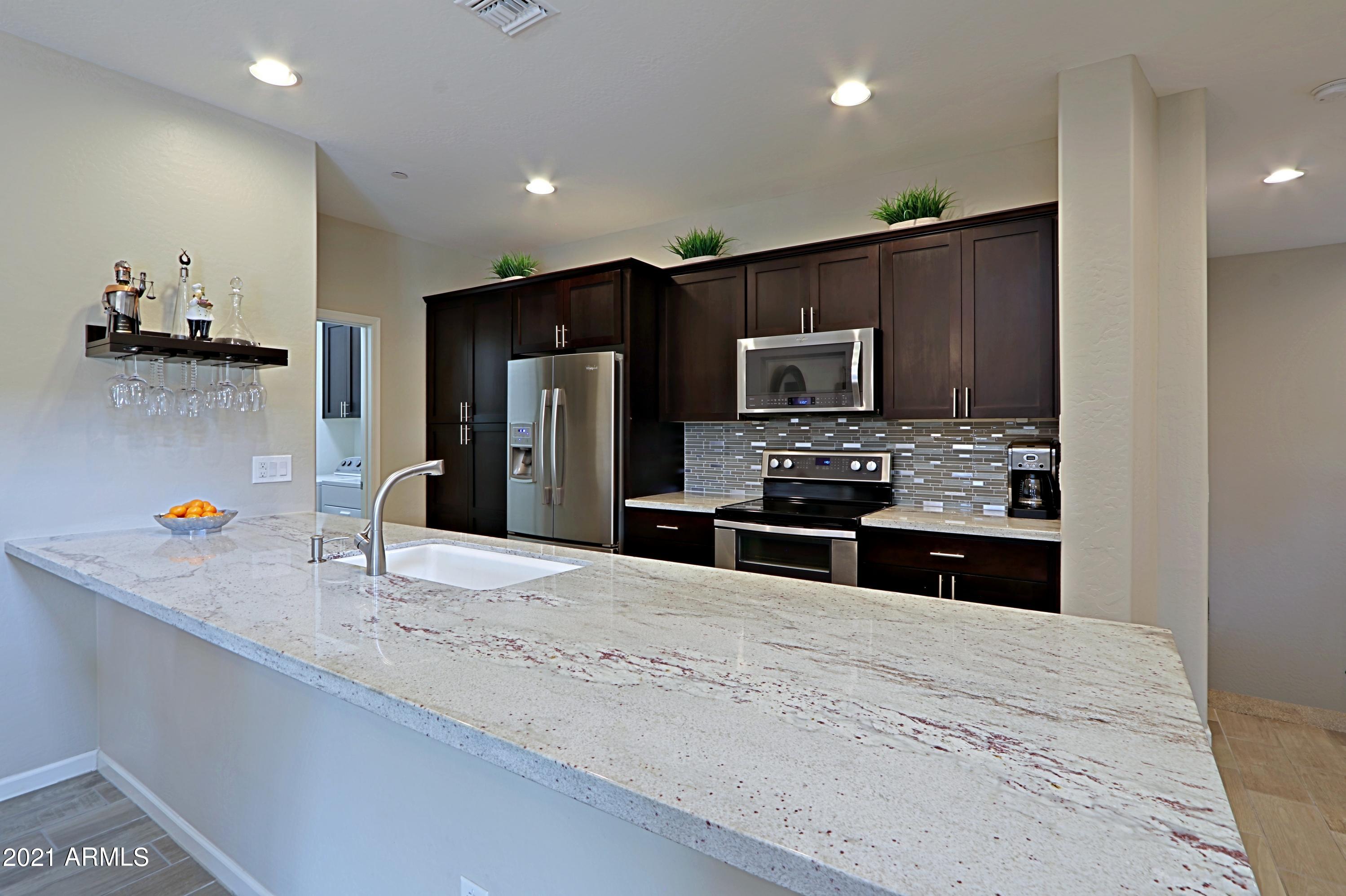 3935 East Rough Rider Road, Unit 1312 Phoenix, AZ 85050 - Photo 5 of 47 Kitchen