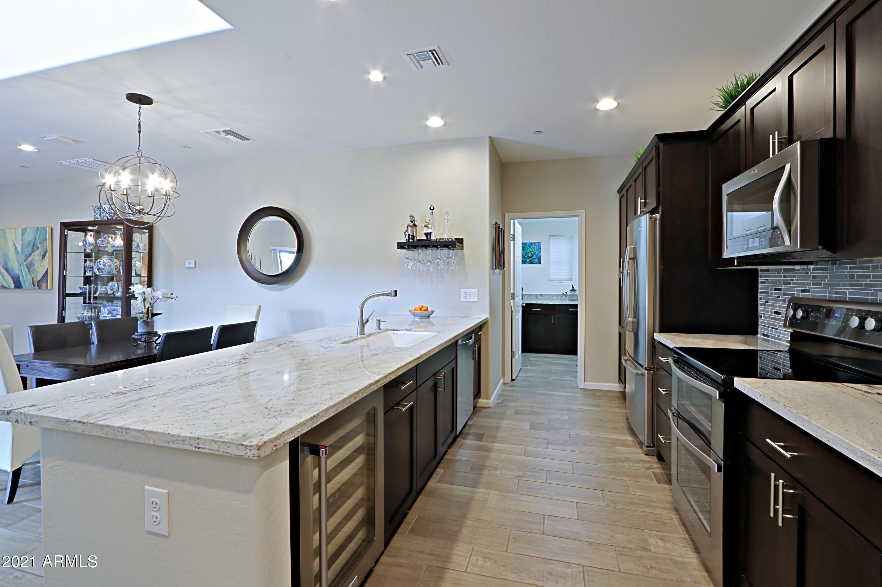 3935 East Rough Rider Road, Unit 1312 Phoenix, AZ 85050 - Photo 7 of 47 Extended Granite Counter