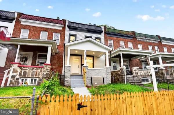 a front view of a house with a porch