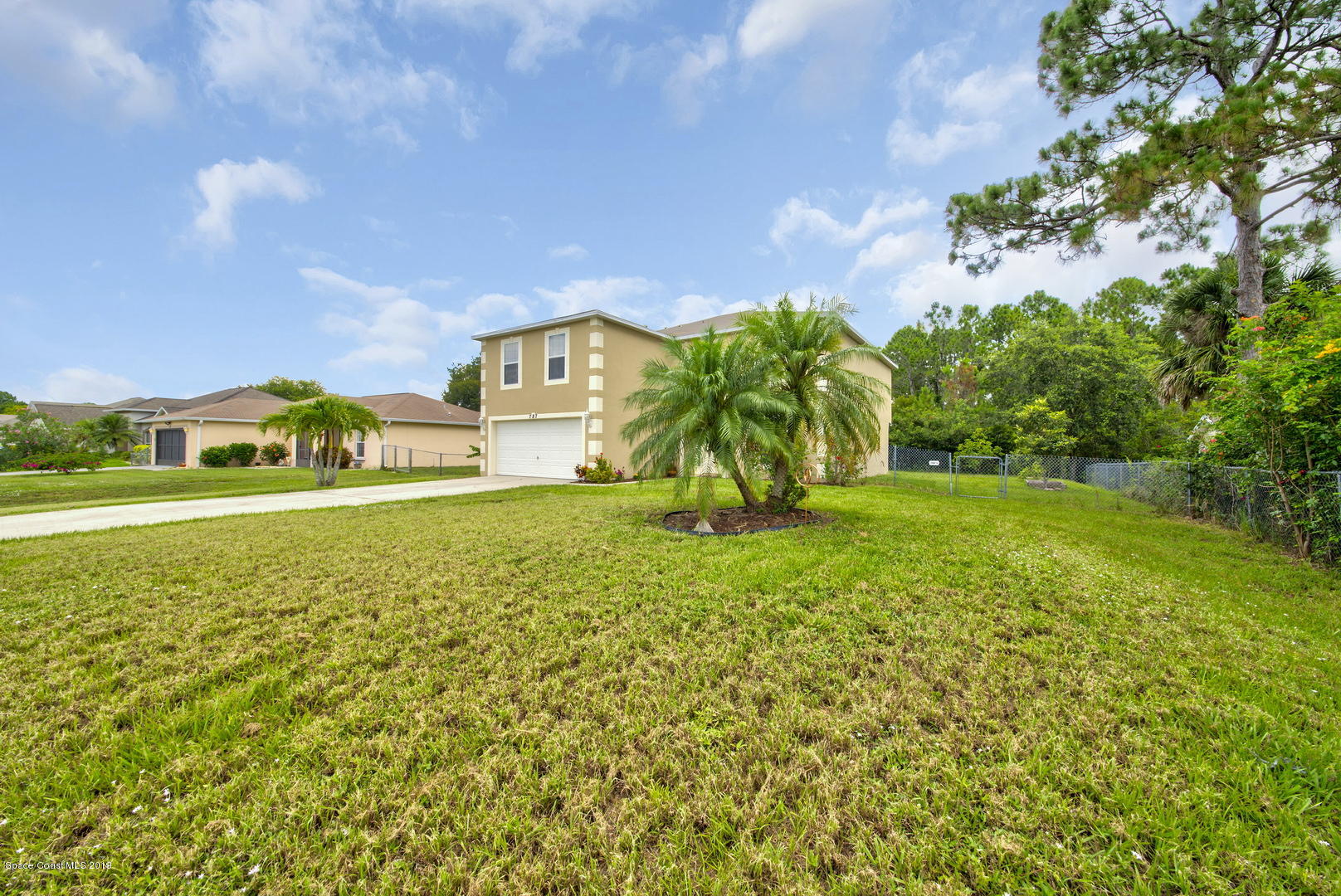787 Raleigh Road Southeast Palm Bay, FL 32909 - Photo 2 of 51 Front of House Right