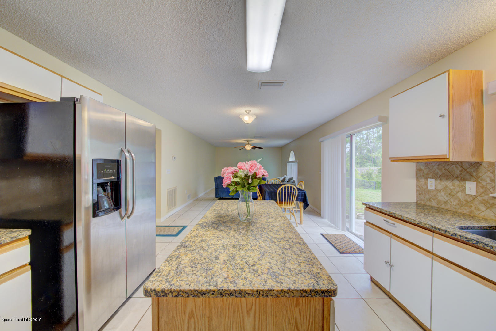 787 Raleigh Road Southeast Palm Bay, FL 32909 - Photo 12 of 51 Kitchen Open to Living Area