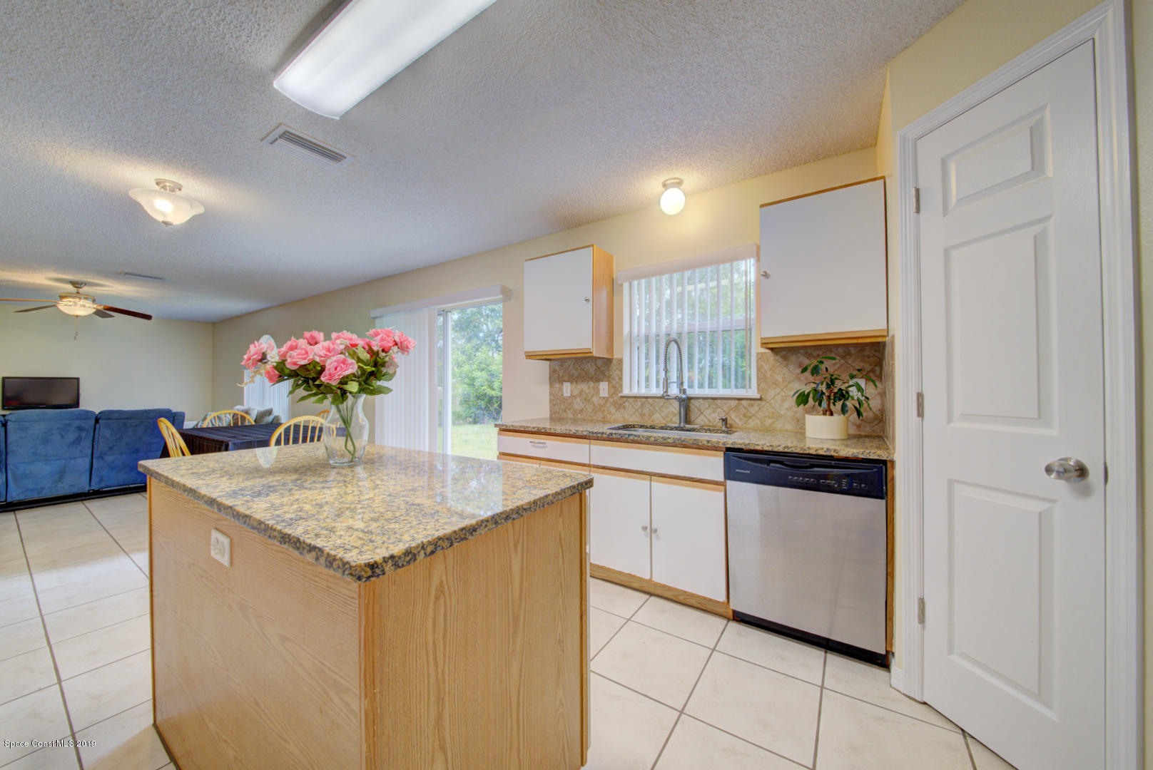 787 Raleigh Road Southeast Palm Bay, FL 32909 - Photo 15 of 51 Kitchen With Corner Pantry #2