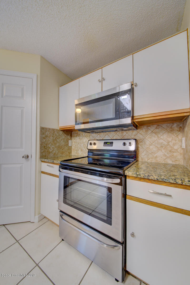 787 Raleigh Road Southeast Palm Bay, FL 32909 - Photo 17 of 51 Kitchen With Stainless Appliances