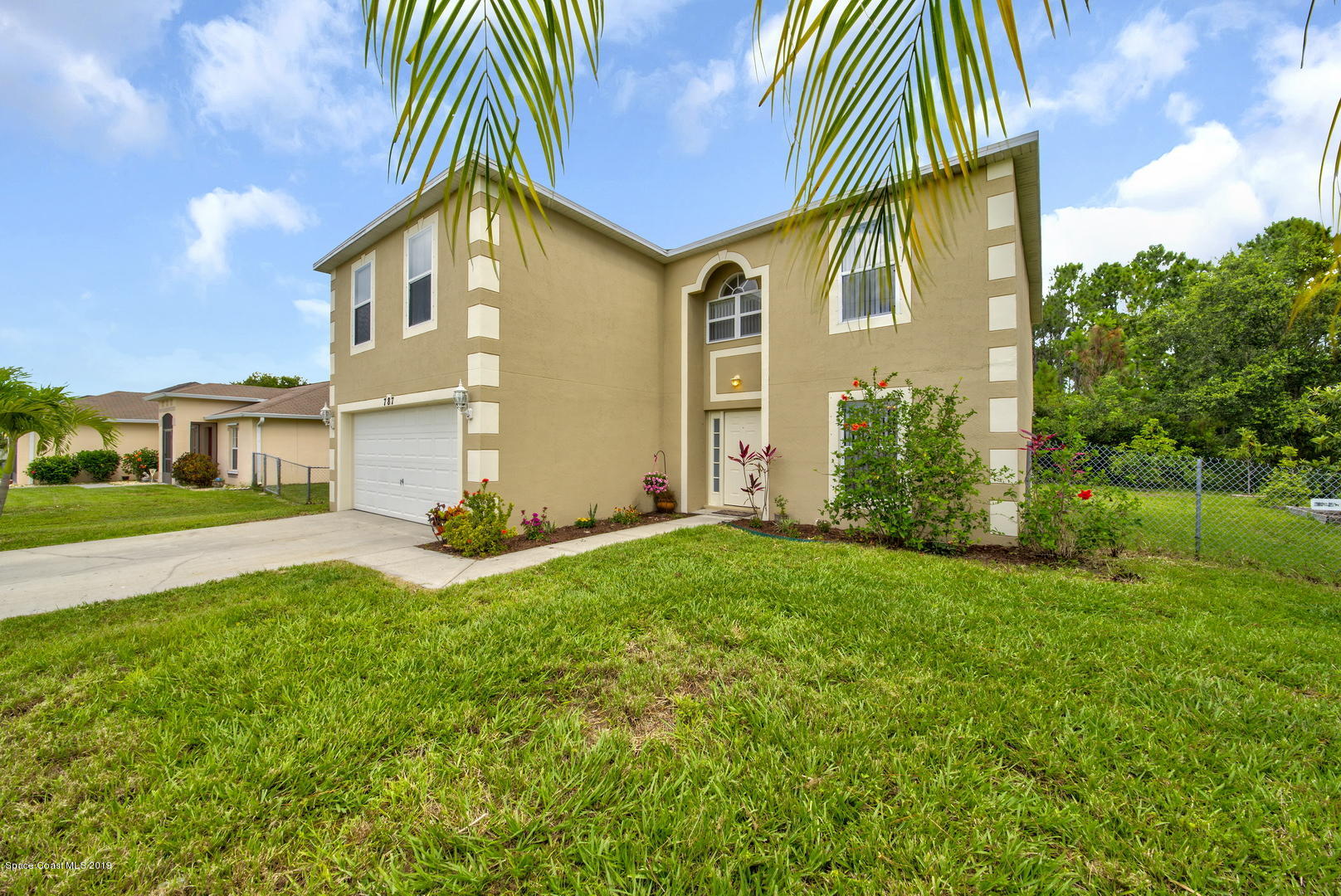 787 Raleigh Road Southeast Palm Bay, FL 32909 - Photo 3 of 51 Front of House Right Close-up