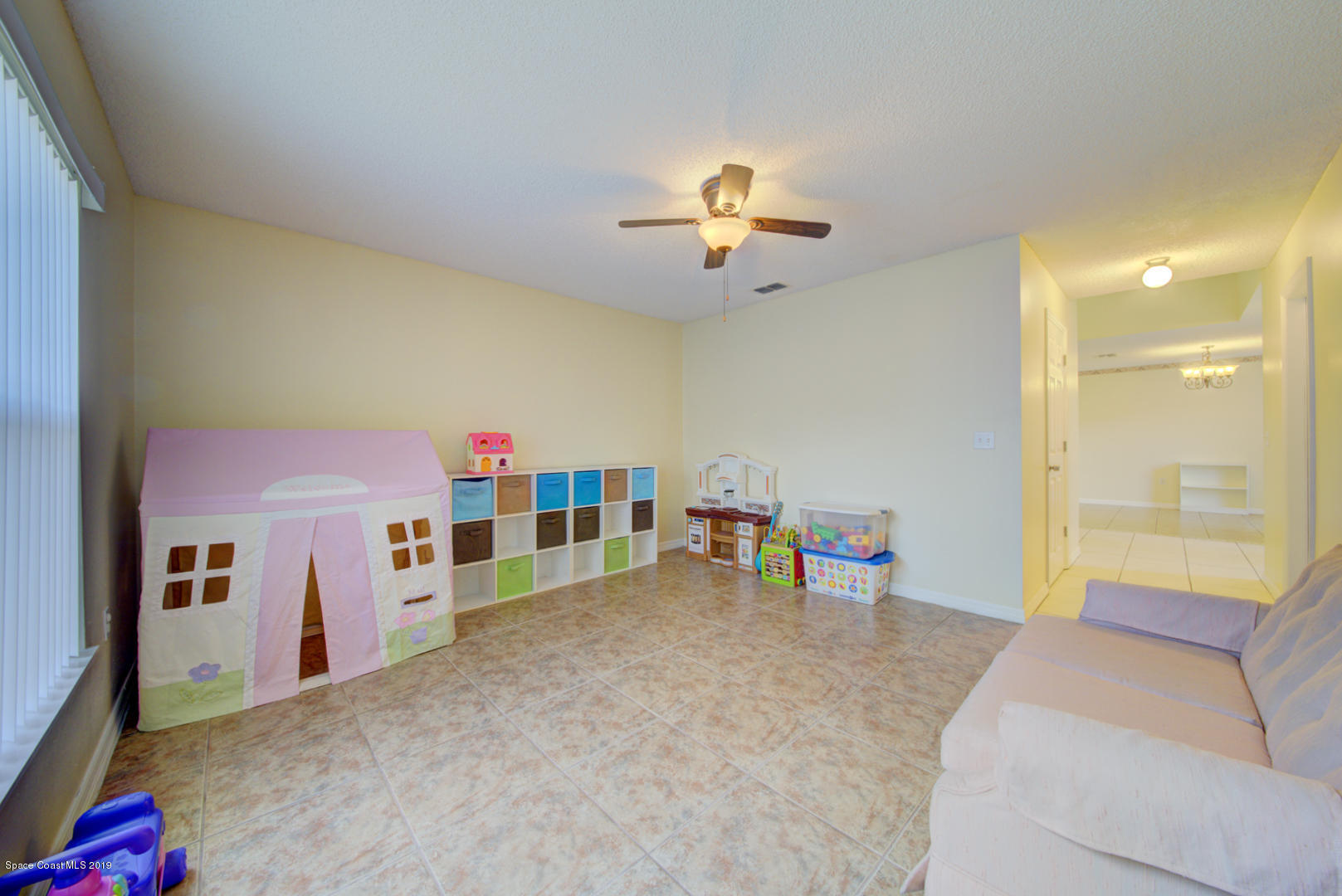 787 Raleigh Road Southeast Palm Bay, FL 32909 - Photo 25 of 51 Playroom or Office off Foyer