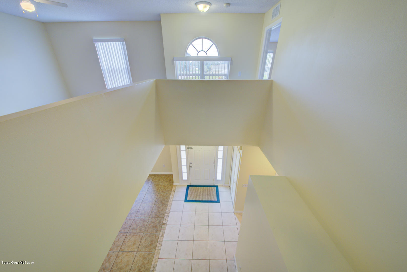 787 Raleigh Road Southeast Palm Bay, FL 32909 - Photo 28 of 51 View of Foyer From Loft
