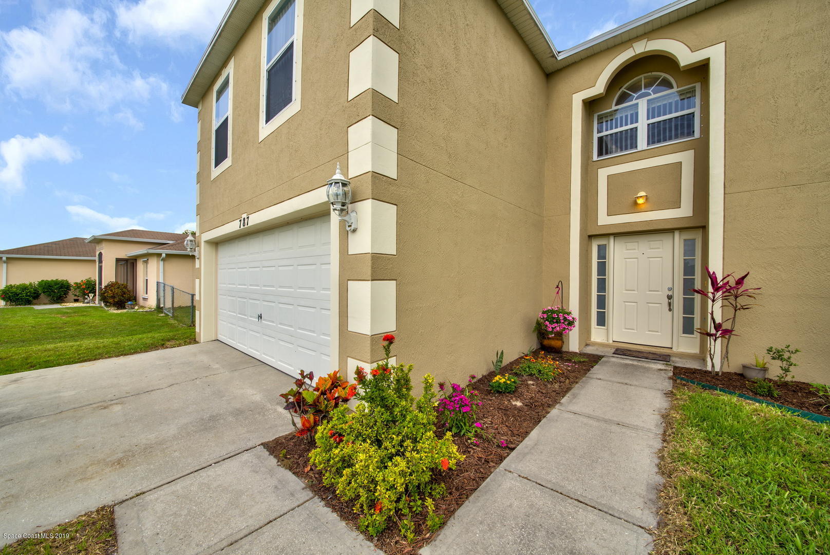 787 Raleigh Road Southeast Palm Bay, FL 32909 - Photo 4 of 51 Walkway to Front Door