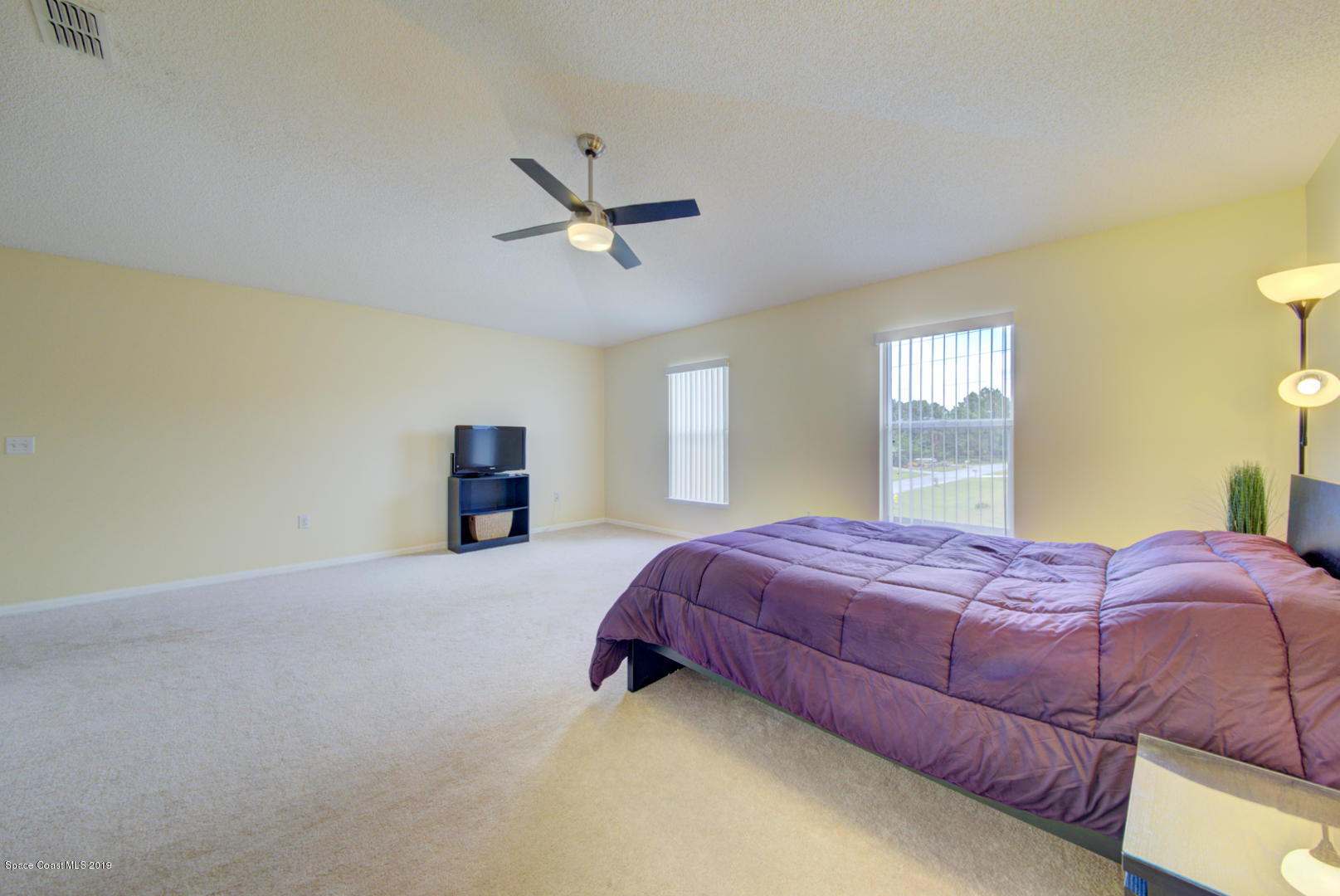 787 Raleigh Road Southeast Palm Bay, FL 32909 - Photo 32 of 51 Master Bedroom With Vaulted Ceilings