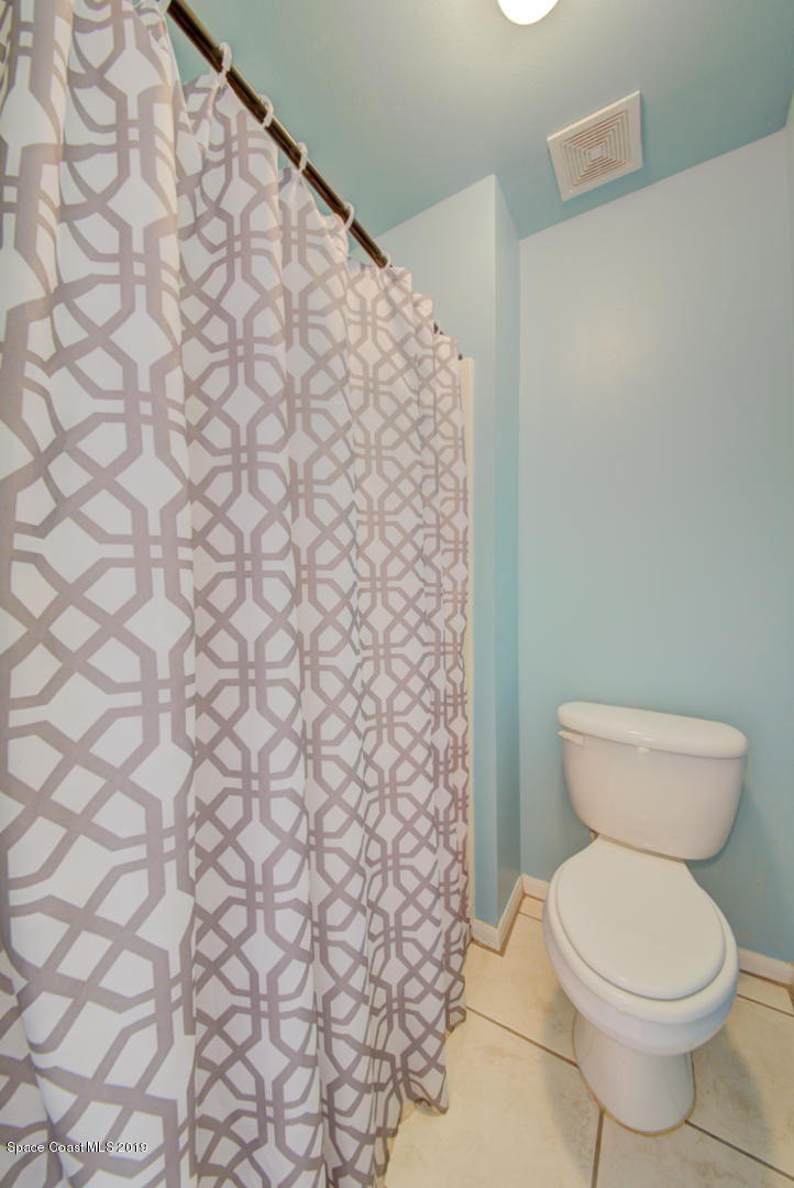 787 Raleigh Road Southeast Palm Bay, FL 32909 - Photo 37 of 51 Master Bathroom Shower &Toilet