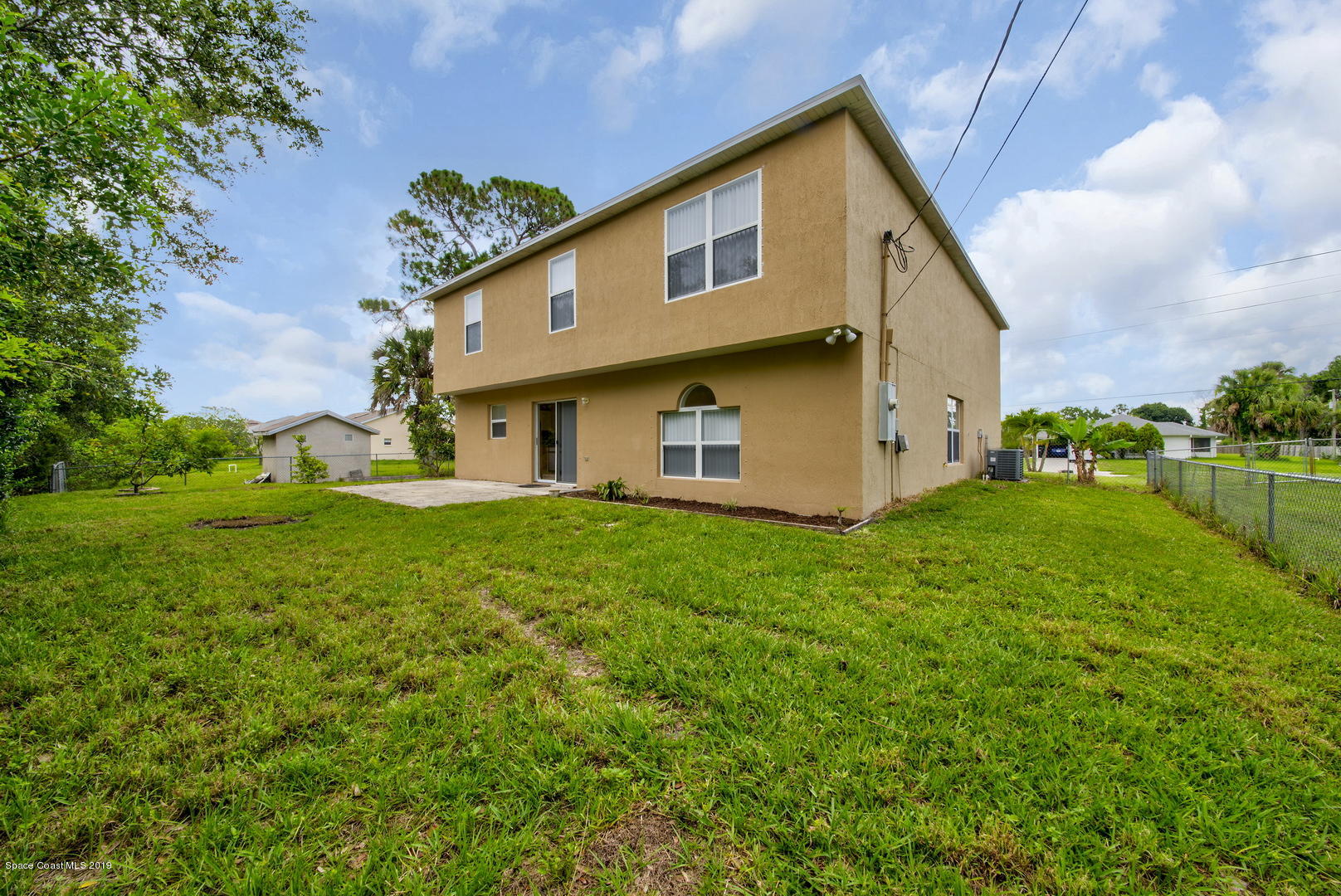 787 Raleigh Road Southeast Palm Bay, FL 32909 - Photo 47 of 51 Back of House Right