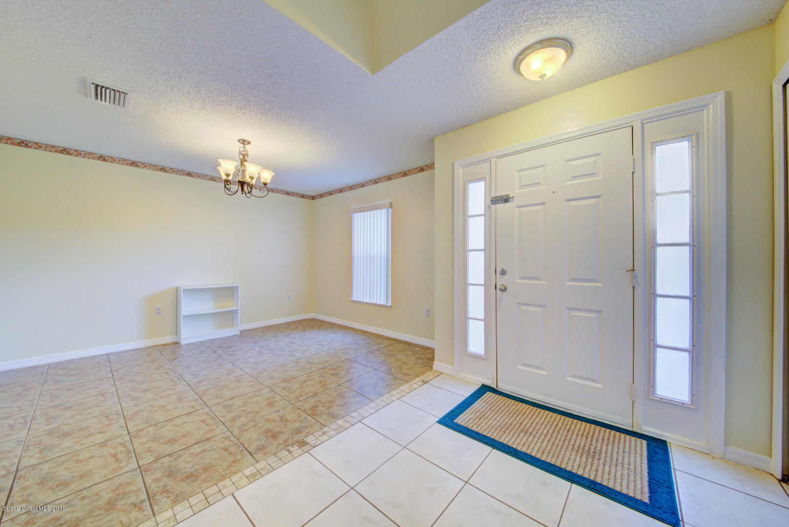 787 Raleigh Road Southeast Palm Bay, FL 32909 - Photo 6 of 51 Foyer