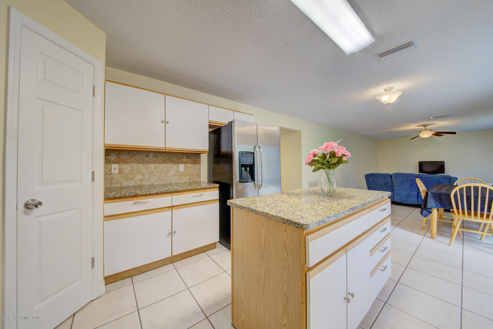 787 Raleigh Road Southeast Palm Bay, FL 32909 - Photo 10 of 51 Kitchen With Corner Pantry #1