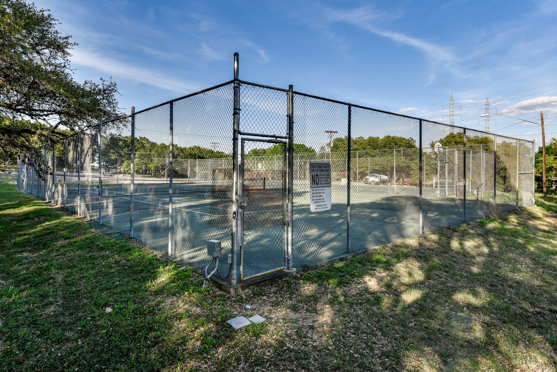 14922 Running Deer Trail Austin, TX 78734 - Photo 10 of 31 View of tennis court featuring a gate and fence