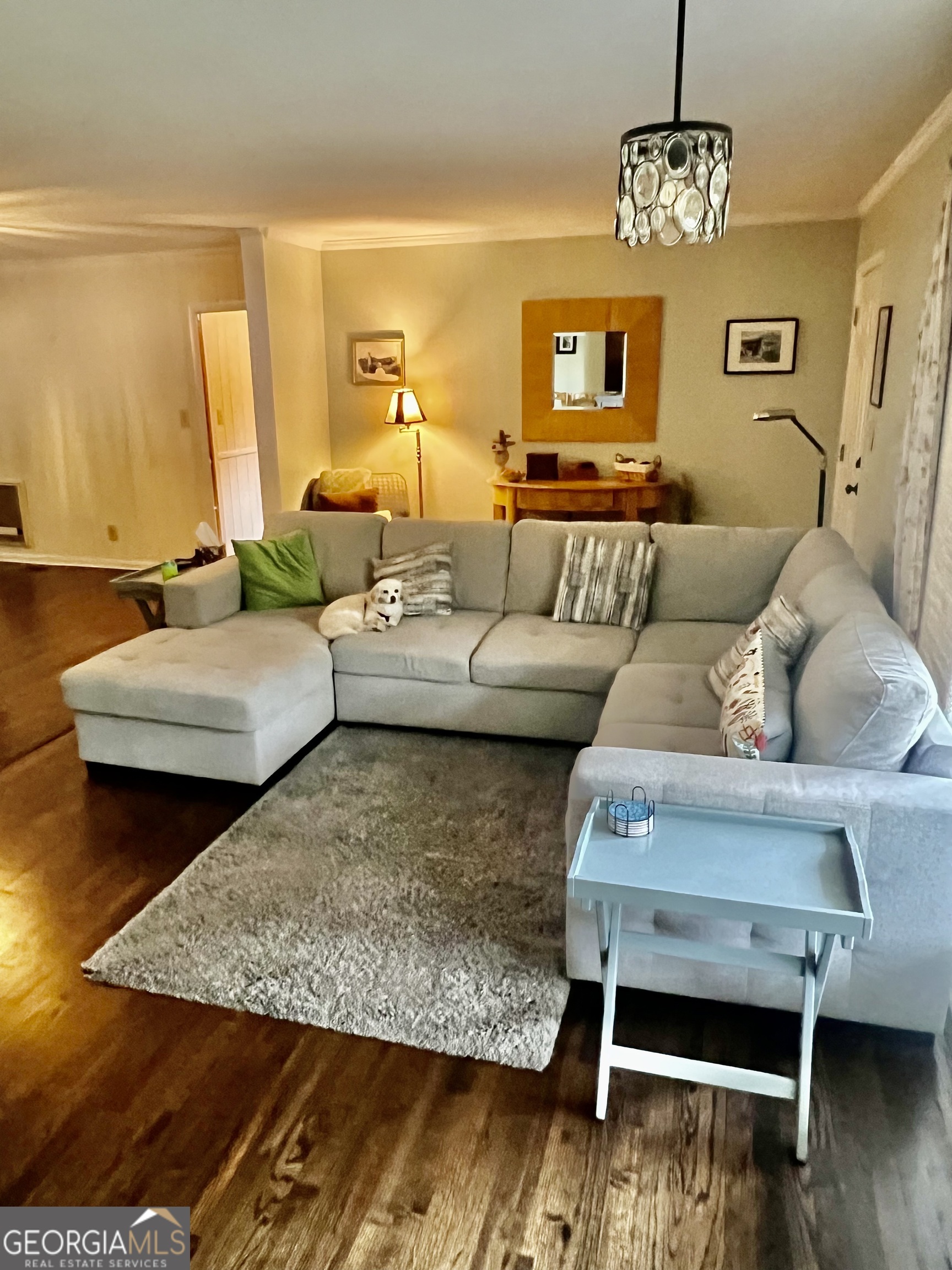 1204 Rock Chapel Road Lithonia, GA 30058 - Photo 2 of 11 a living room with furniture and wooden floor