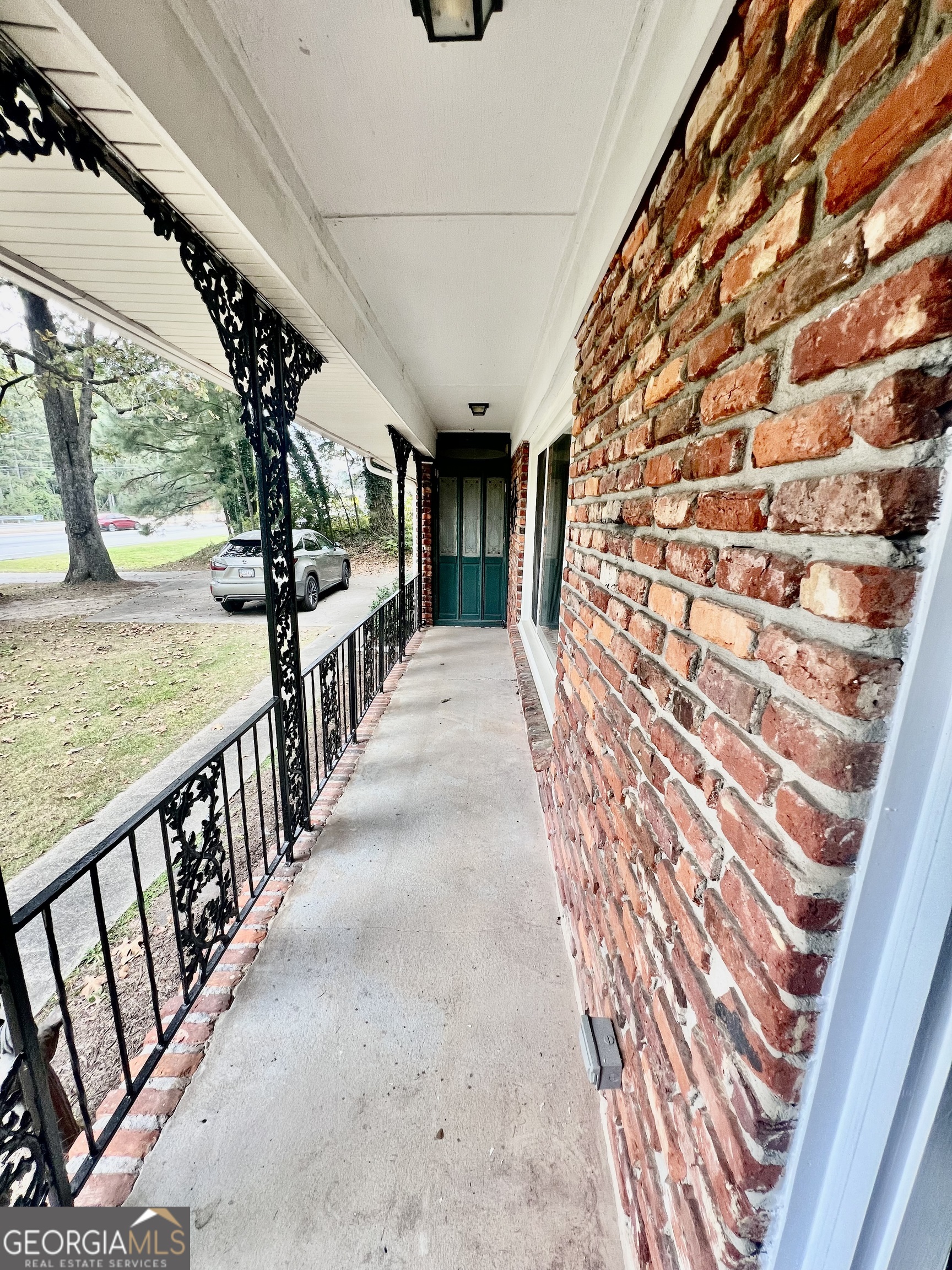 1204 Rock Chapel Road Lithonia, GA 30058 - Photo 5 of 11 a view of a porch