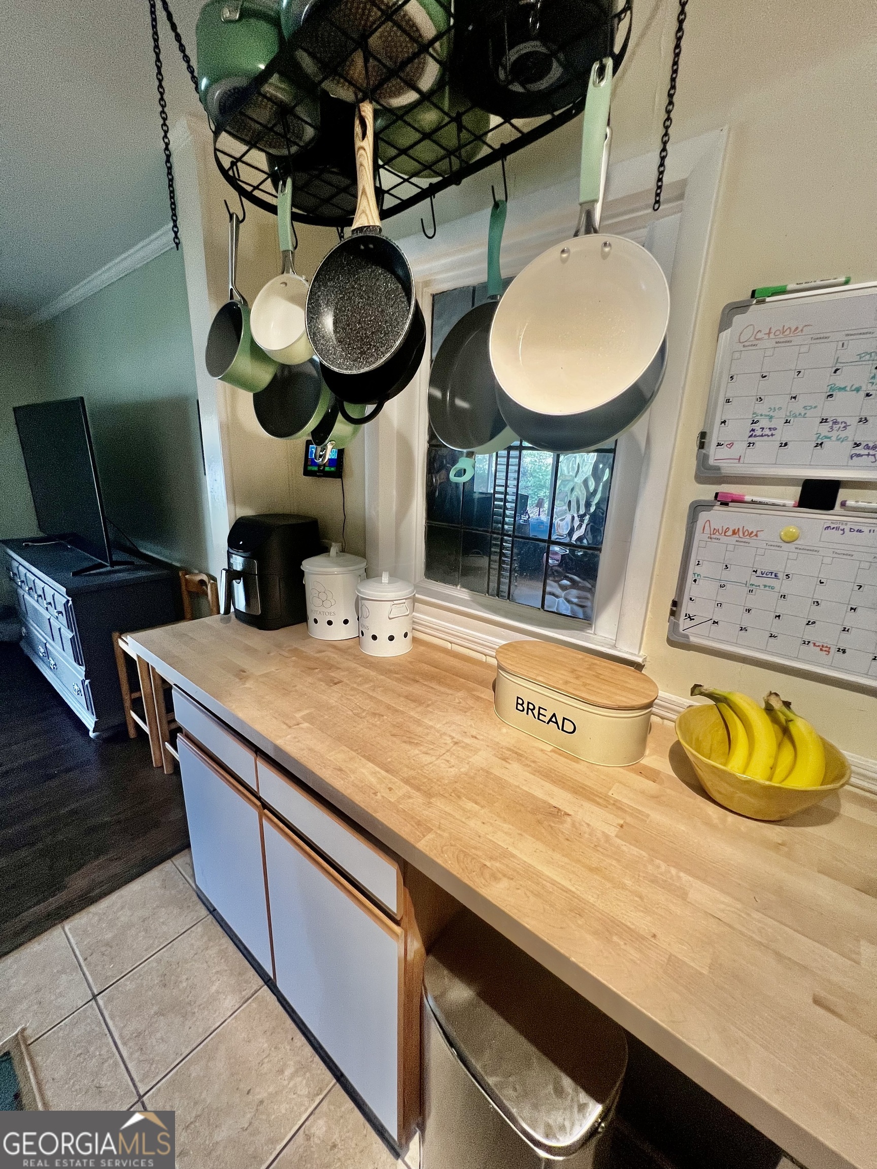 1204 Rock Chapel Road Lithonia, GA 30058 - Photo 7 of 11 a kitchen with stainless steel appliances granite countertop a sink and a stove