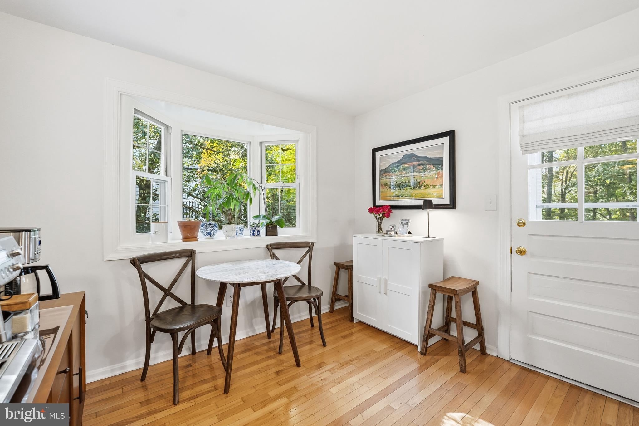 6032 Grove Drive Alexandria, VA 22307 - Photo 11 of 40 a view of a dining room with furniture window and outside view