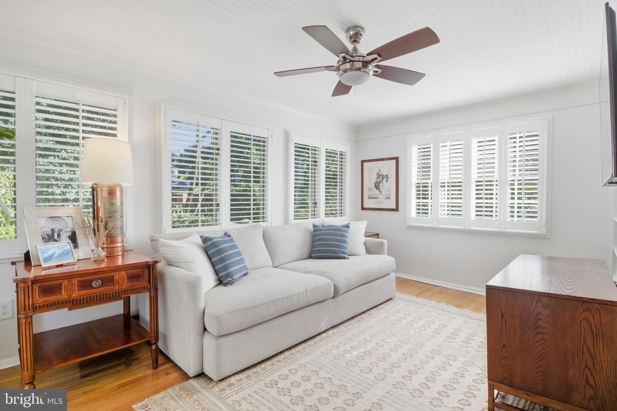 6032 Grove Drive Alexandria, VA 22307 - Photo 16 of 40 a living room with furniture and windows