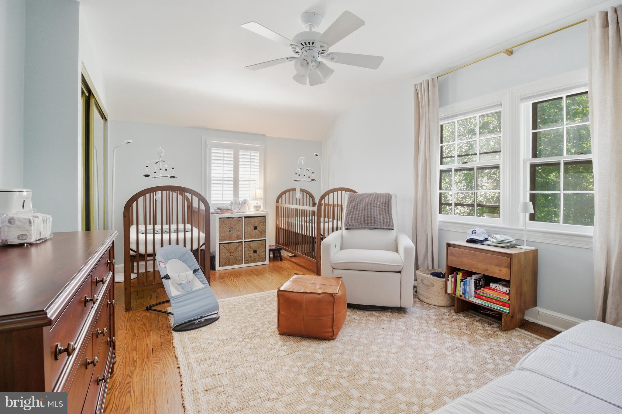 6032 Grove Drive Alexandria, VA 22307 - Photo 21 of 40 a living room with furniture stairs and a window