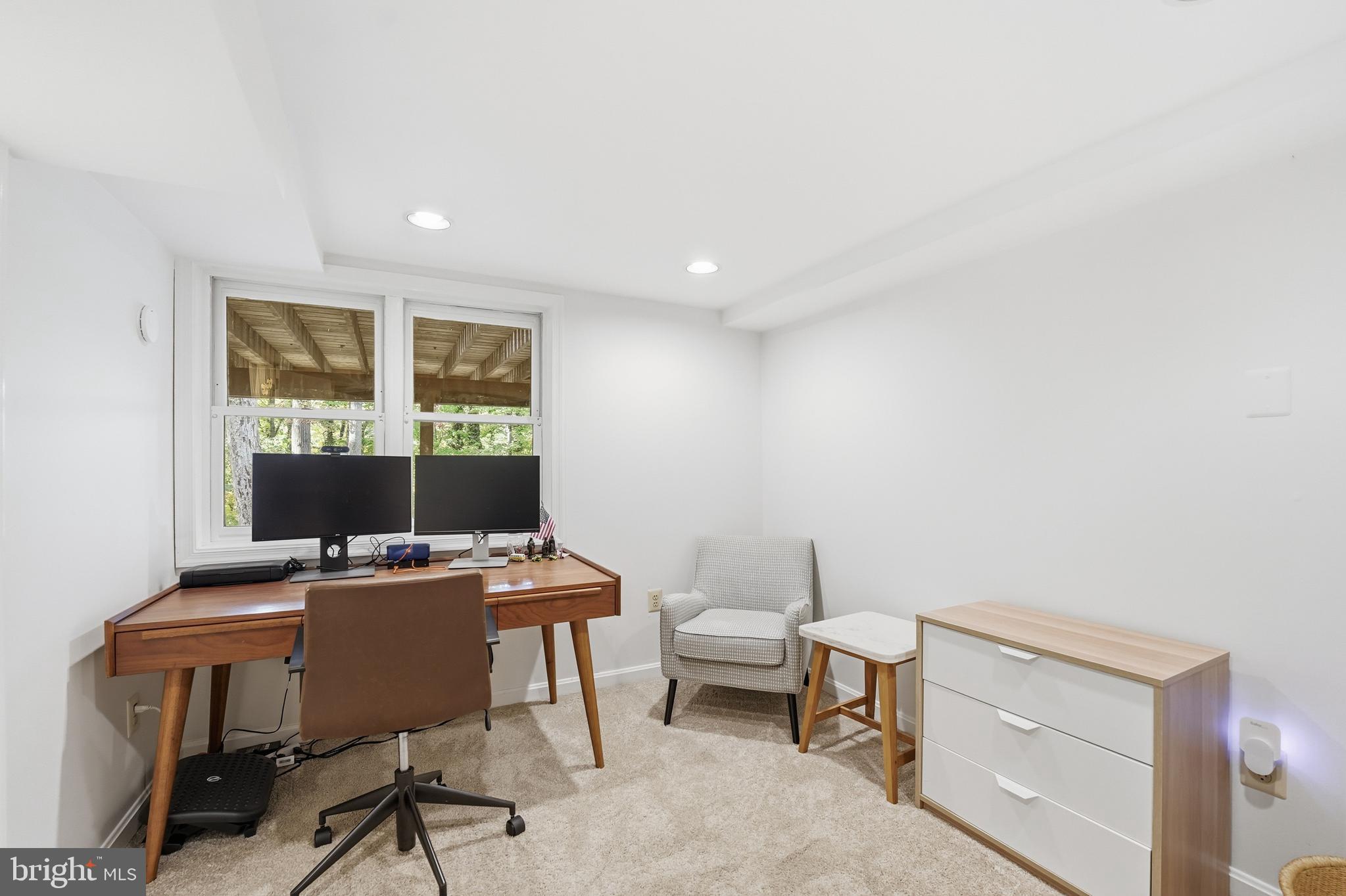 6032 Grove Drive Alexandria, VA 22307 - Photo 26 of 40 a view of a workspace with furniture