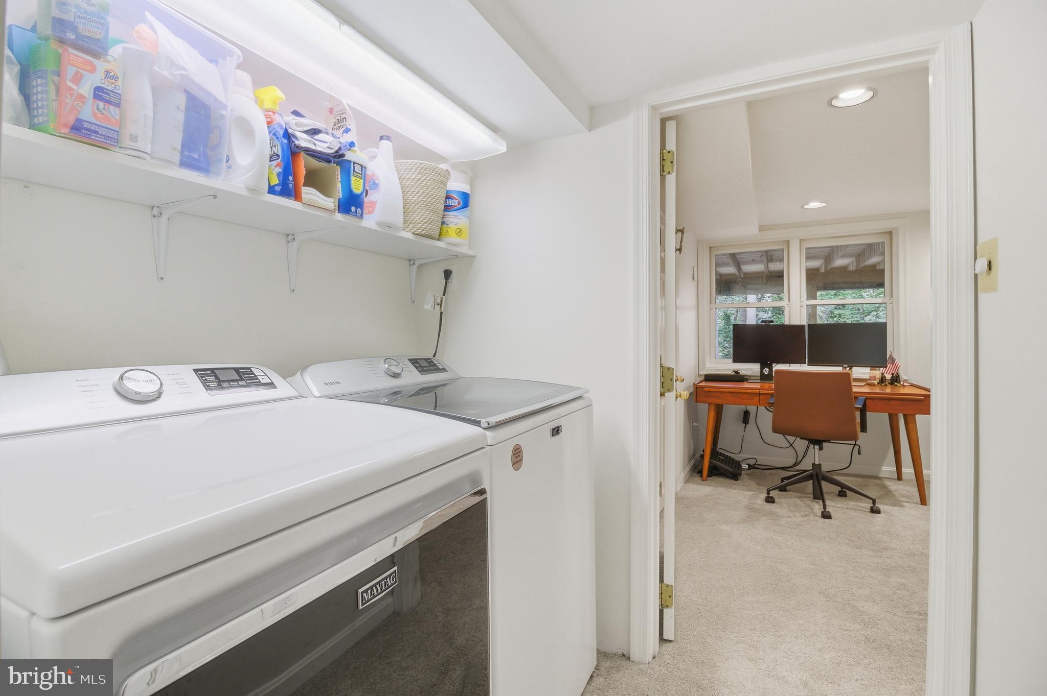 6032 Grove Drive Alexandria, VA 22307 - Photo 28 of 40 a utility room with dryer washer and a view of living area