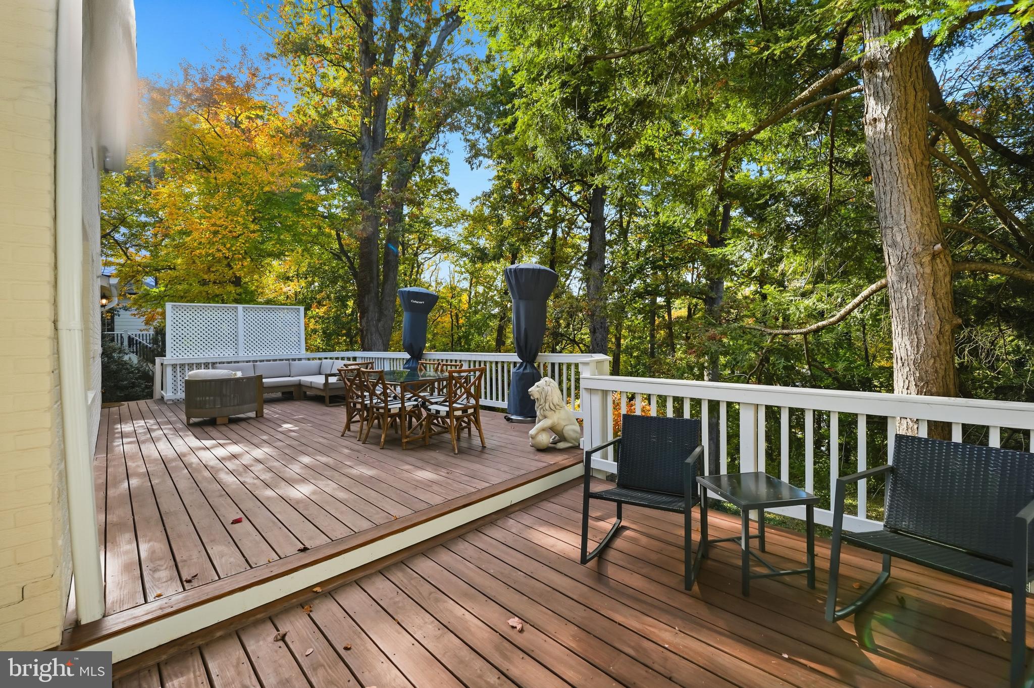 6032 Grove Drive Alexandria, VA 22307 - Photo 31 of 40 a view of balcony with furniture and trees