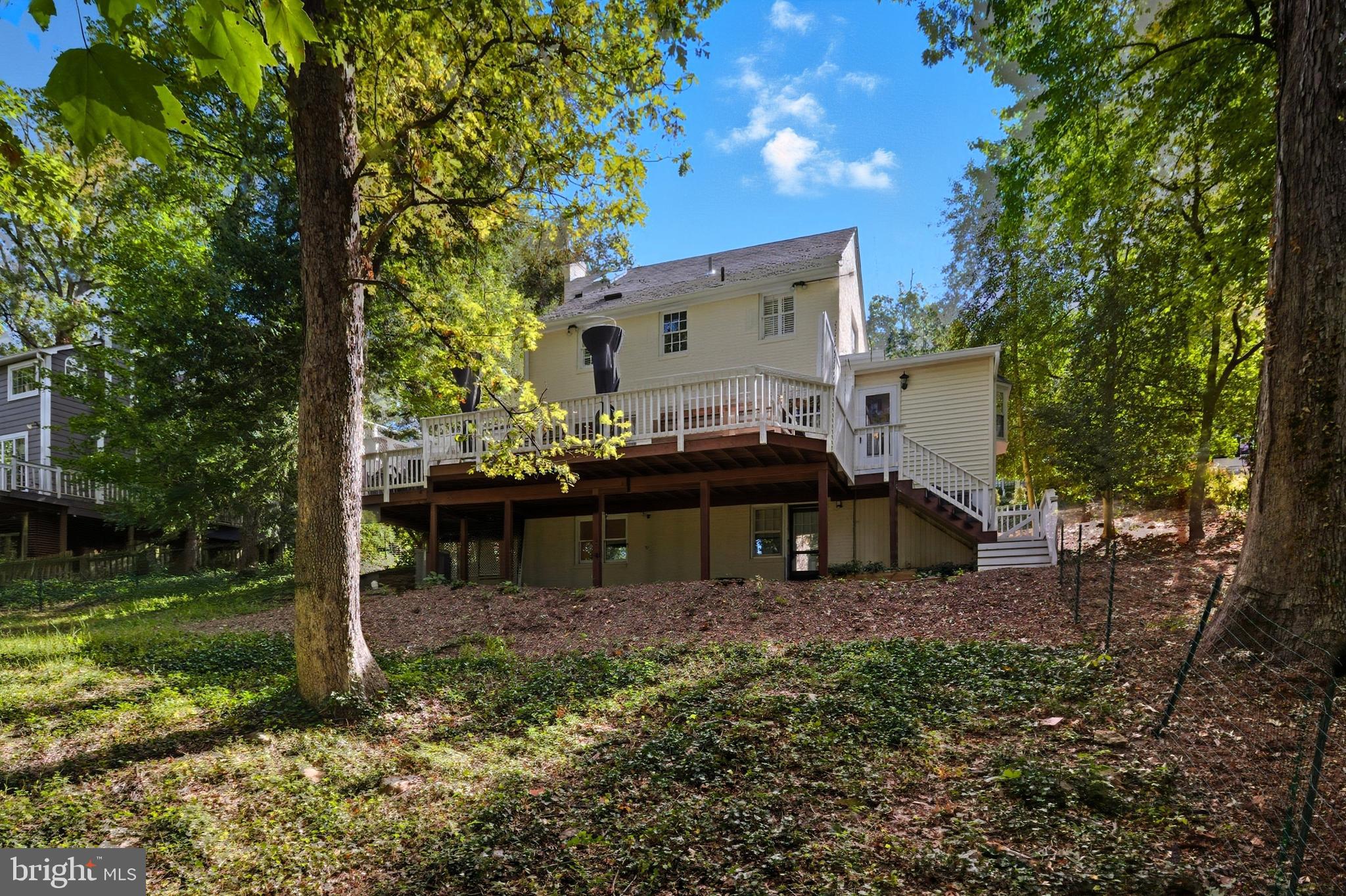 6032 Grove Drive Alexandria, VA 22307 - Photo 34 of 40 a house view with a sitting space and garden space