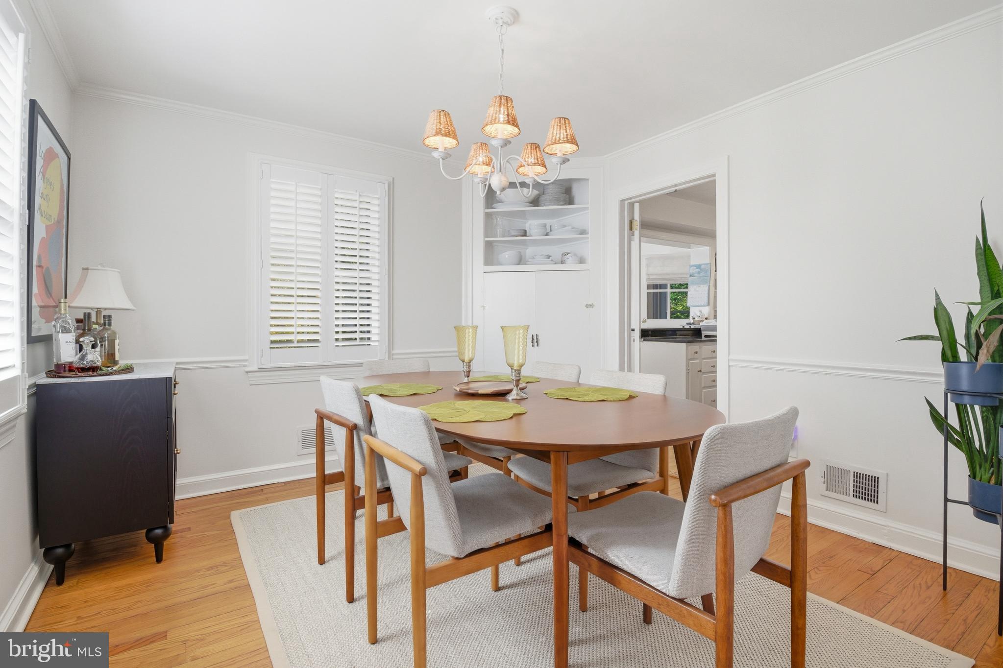 6032 Grove Drive Alexandria, VA 22307 - Photo 6 of 40 a view of a dining room with furniture and wooden floor