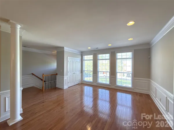 a view of balcony with deck and wooden floor